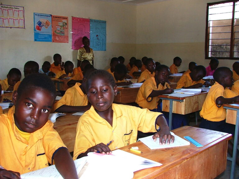 Children at Tumaini School smiling and learning