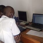 Close-up of student with laptop