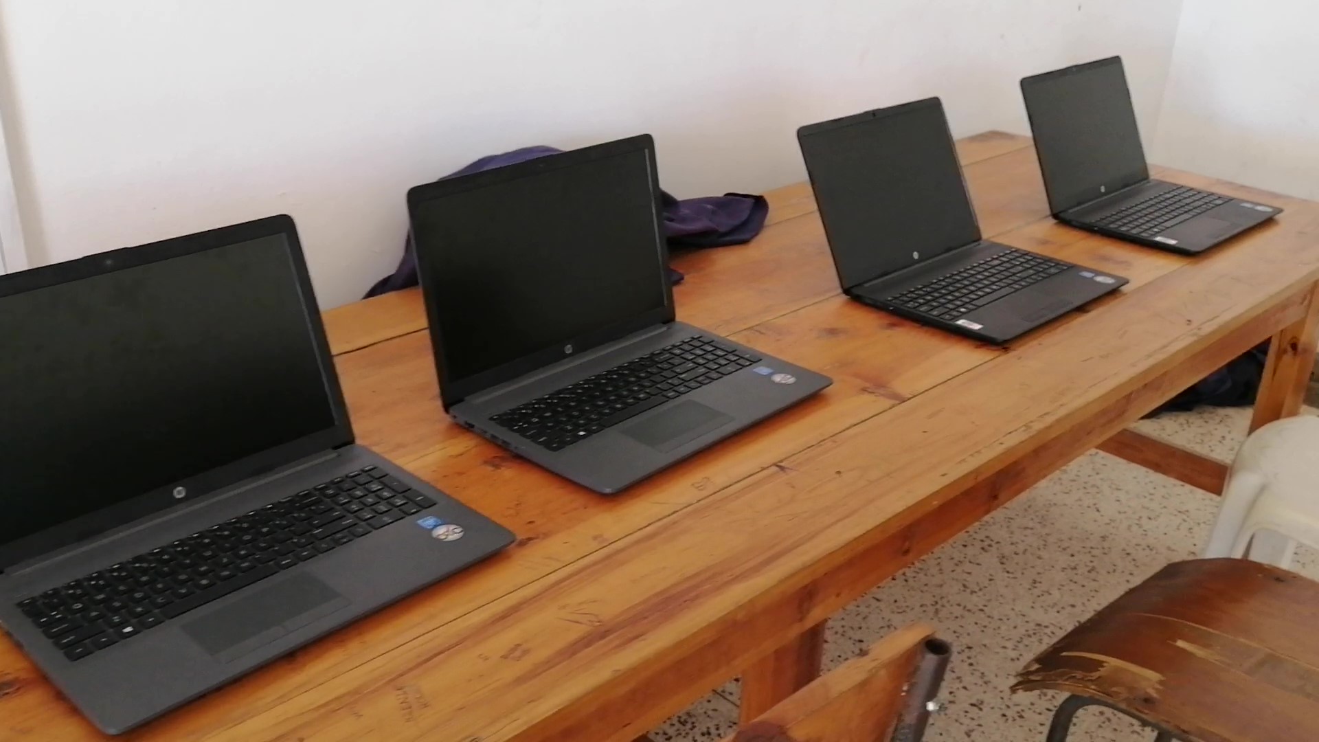 Students sharing laptop