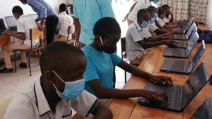 Student using laptop in class